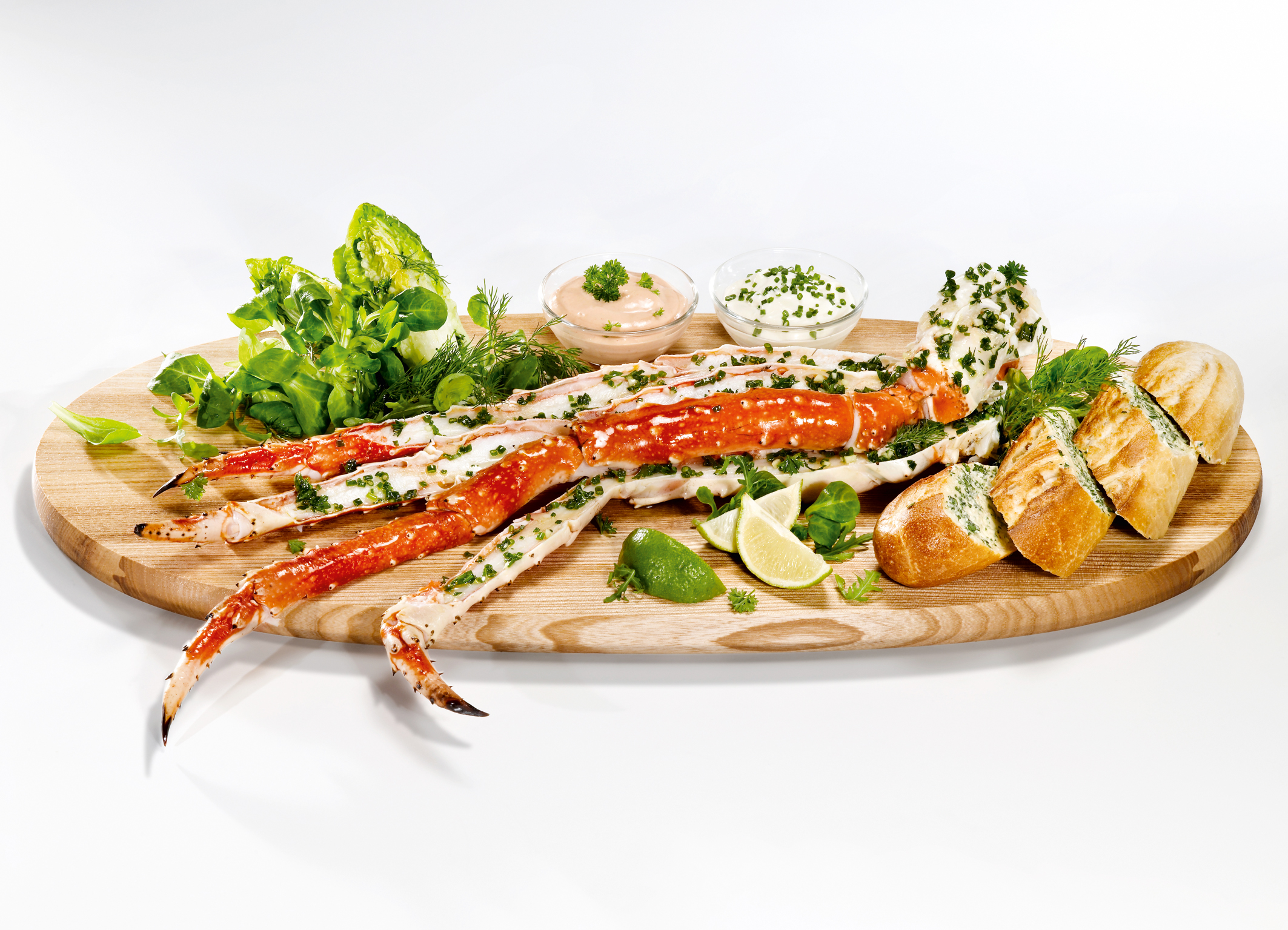 Crab-Legs mit französischem Kräuterbaguette Foto: Landzeit